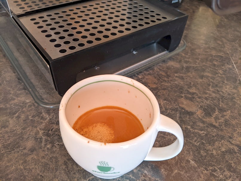 Espresso shot pulled into a cappuccino cup.