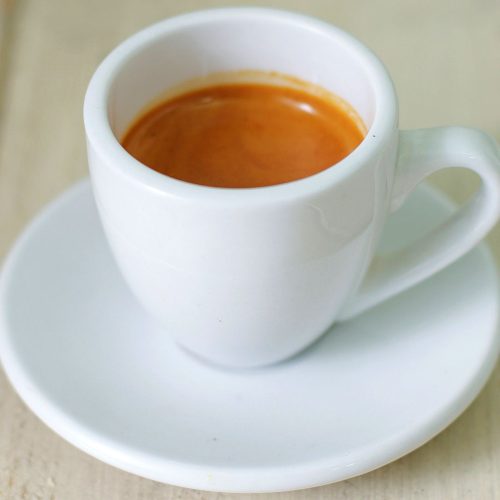 ristretto shot in porcelain demitasse with saucer