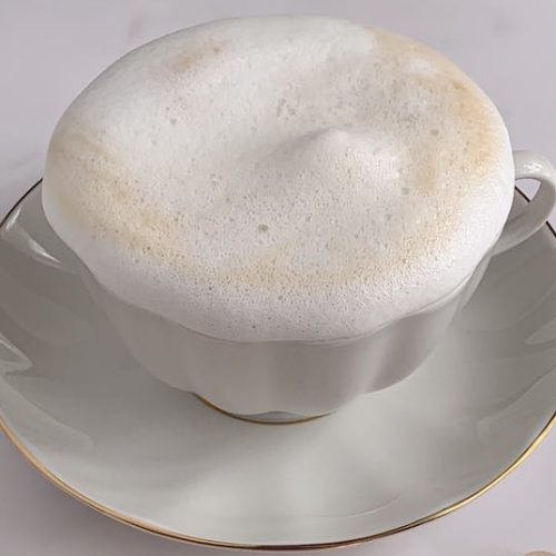 Dry cappuccino with a foamy milk head